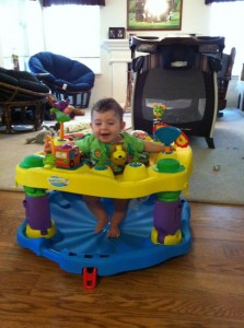 LP loves his exersaucer!