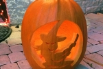 Pumpkin, carved by Daddy and LP. Based on a stencil, but drawn freehand by Daddy.